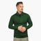 Mann trägt Merino Jacke Herren 270 g/m² mit Reißverschluss, Brusttasche und Seitentaschen, ideal für Outdoor-Abenteuer und Alltag, aus Merinowolle-Mix für Komfort und Funktionalität.