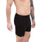 Merino Boxershorts Herren 150 g/m² zeigt elastischen Bund, Frontöffnung und Logo; ideal für Outdoor-Aktivitäten mit CORESPUN-Technologie für Komfort und Funktionalität.